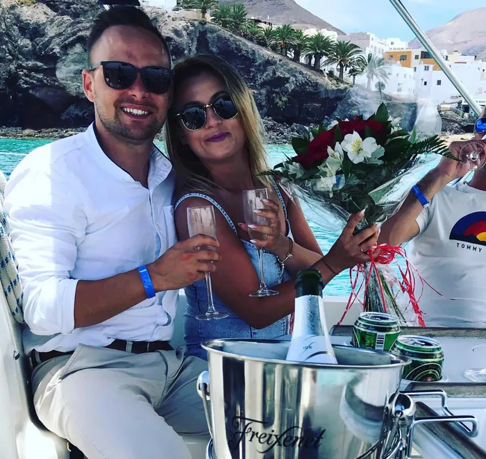 Glasses, flowers and a special moment on board KATE.